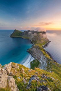 View from Håheia or Håen mountain to mountains and coast, evening mood, Måstad peninsula, Værøy