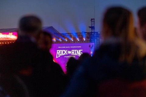 Adenau, Germany, 7 June 2024: Fans enjoy the Rock am Ring Festival during the blue hour. The