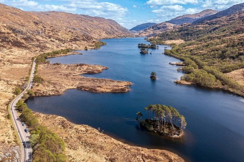 Aerial view of island Dumbledore's Grave, Harry Potter film location, lake Loch Eilt, scottisch