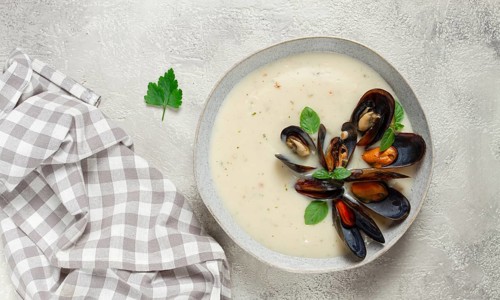 Chowder cream soup with mussels, American cuisine, homemade, no people