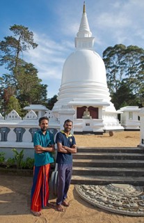 Sri Lankan men at the Chayathi Stupa in the International Buddhist Centre Temple, Nuwara Eliya,