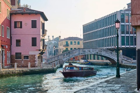 View from 'Fondamenta del pagan' to 'Ponte de la cereria' an the waterway in Venice on a sunny day