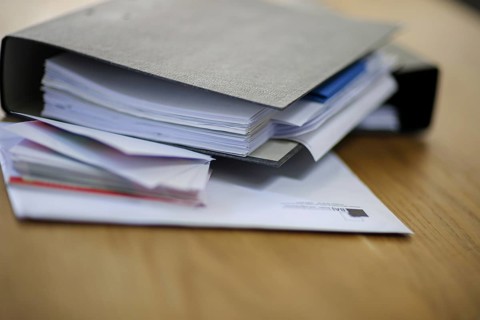Symbolic photo on the subject of files. File folders lie on a table. Berlin, 13.08.2024