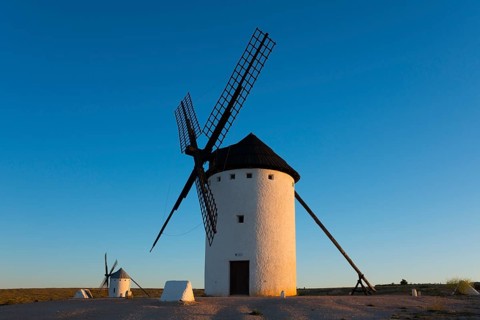 A large white windmill stands out clearly against a clear blue sky, Campo de Criptana, Ciudad Real