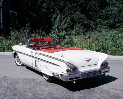 White with chrome and red trim 1958 Chevrolet Impala convertible classic automobile, Quebec,