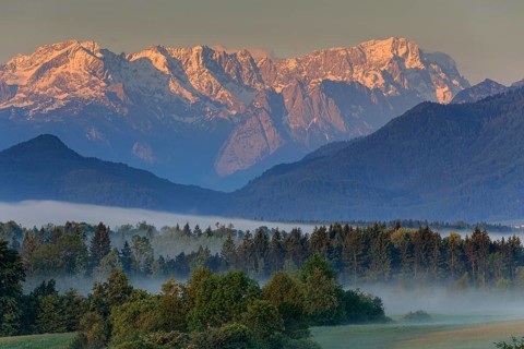Morning fog over the foothills of the Alps, near Murnau, Wetterstein Mountains and Zugspitze in the