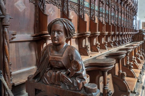 Figure on the late Gothic choir stalls from 1507, St Martin, Memmingen, Bavaria, Germany, Europe