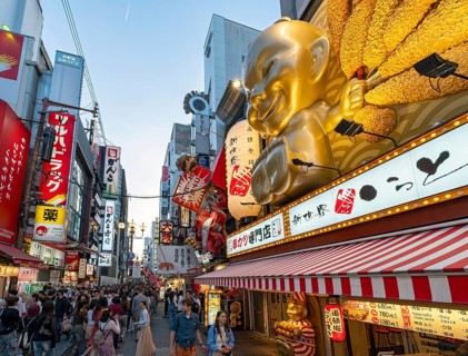 Night-time street with neon lights and illuminated signboards, Dotonbori district, Osaka, Japan,