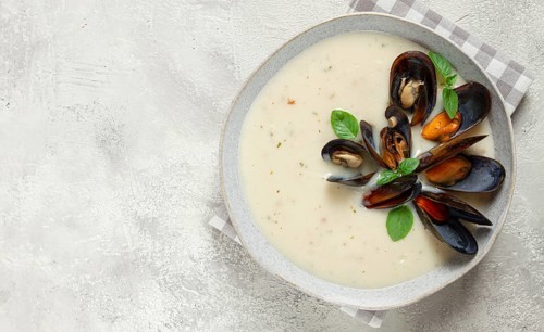 Chowder cream soup with mussels, American cuisine, homemade, no people