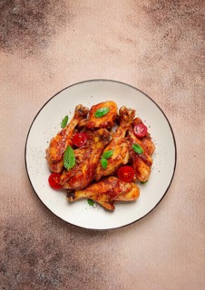 Fried chicken legs, in soy sauce, spices, herbs, top view, homemade