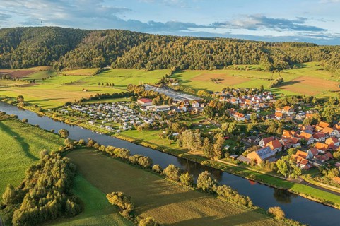 Aerial view of village Oedelsheim and the Weser river at sunset, traditional ferry, Weserbergland,