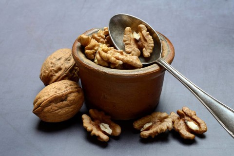 Walnut, walnuts in pots with spoon, Juglans regia