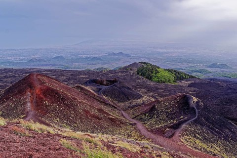 Lava rock and crater landscape around the Crateri Silvestri in the Etna National Park, Parco