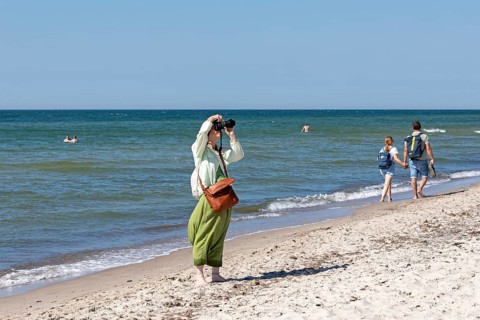 Elderly woman photographed on the beach, Darßer Ort, Born a. Darß, Mecklenburg-Vorpommern, Germany,