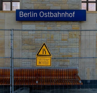 S-Bahn, construction fence in front of a bench at Berlin Ostbahnhof, Friedrichshain, Berlin,
