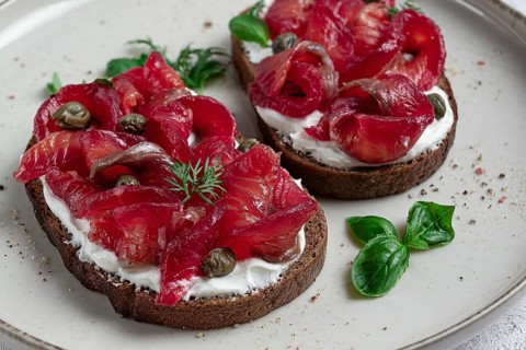 Sandwiches with gravlax salmon, cream cheese, capers, greens, breakfast, homemade