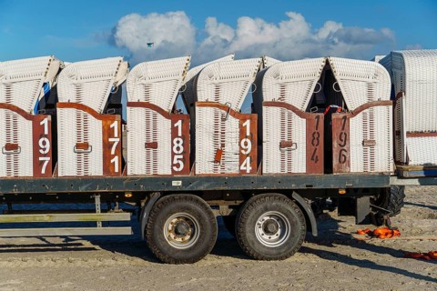 Beach chairs are transported away at the end of the season, beach chair, tractor, beach, season,