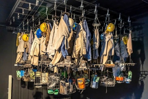 Ceiling of the Schwarzkaue with the miners' clothing, exhibition in the German Mining Museum