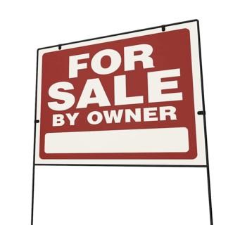 Left facing for sale by owner real estate yard sign isolated on a white background.