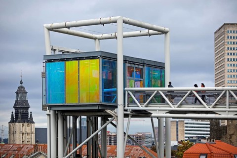 Marollescenece, art installation The Cube, coating of the windows with translucent dichroic films,