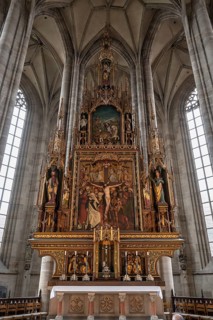 High altar, completed in 1642, replaced by neo-Gothic carvings in 1856, late Gothic hall church of