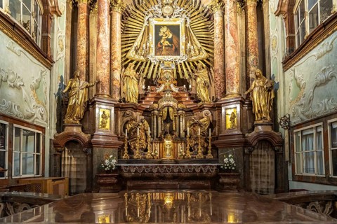 Altar of the baroque parish church Mariahilfer Kirche in Vienna, Austria, Europe