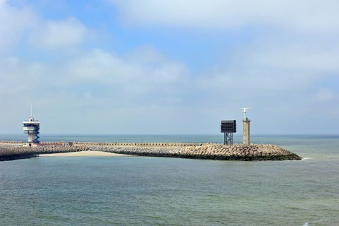Control tower on the breakwater at the entrance to the port of Zeebrugge, Belgium, Europe
