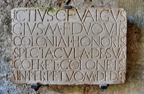 Roman inscription at the entrance to the amphitheater, ancient city of Pompeii, Campania, Italy,