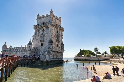 Group of tourists in front of Torre de Belem, landmark, Belém, Lisbon, Portugal, Europe