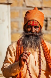 JAISALMER, INDIA, NOVEMBER 28, 2012: Indian sadhu (holy man) blessing. Sadhus are holy men who live