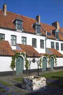 White houses of beguines at the beguinage of Diksmuide, Dixmude, West Flanders, Belgium, Europe