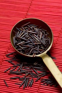Rice, black wild rice in ladle, Canada, North America