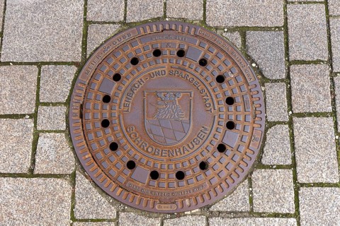 Manhole cover of the town of Schrobenhausen, Upper Bavaria, Germany, Europe