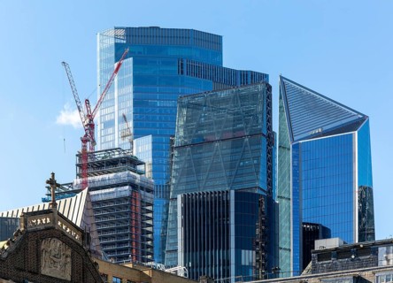Cranes construction work high rise buildngs in financial district, City of London, England, UK