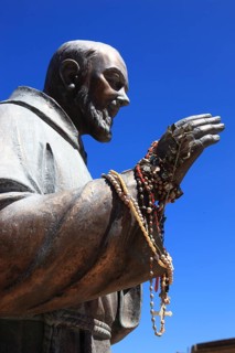 Castellammare del Golfo, statue of Padre Pio of Pietrelcina with prayer chains on his right hand,