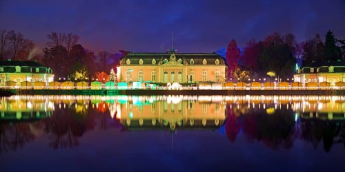 Illuminated Benrath Palace with wing building in the evening at Christmas Wunderwelt, Düsseldorf,