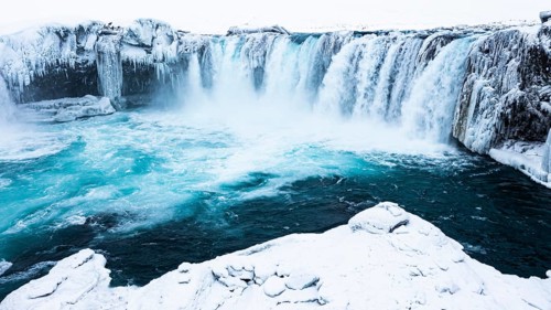 Godafoss waterfall, snowy landscape, drone shot, Northern Iceland Eyestra, Iceland, Europe