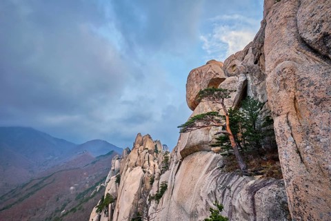View of stone and rock formations from Ulsanbawi rock peak in stormy weather. Seoraksan National