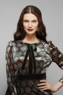 Beautiful fashion model in silk dress with print. Clean fresh face of pretty girl. Blue eyes and
