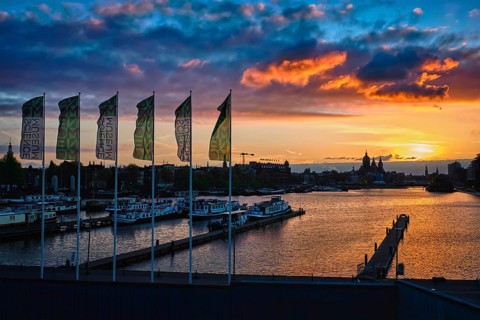 AMSTERDAM, NETHERLANDS, MAY 9, 2018: Amsterdam cityscape skyline with Church of Saint Nicholas