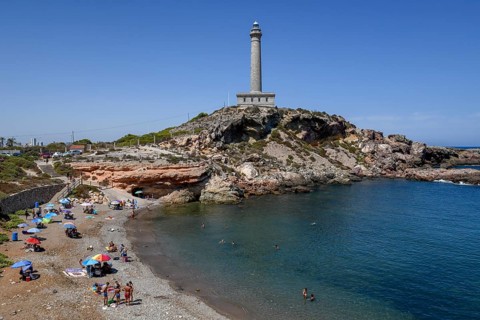 Calafría beach and lighthouse at Cabo de Palos, near La Manga del Mar Menor, Murcia province, Costa