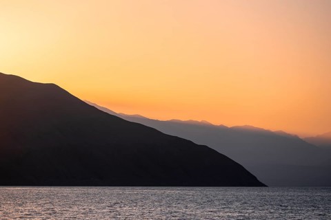 Lake and mountain landscape at sunset, Toktogul reservoir, Jalalabad region, Kyrgyzstan, Asia