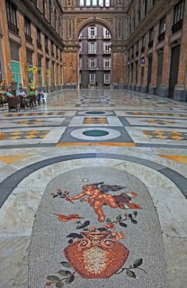 Floor mosaic in the Galleria Umberto I, shopping arcade in the old town of Naples, Campania, Italy,