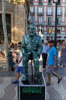 Street performer, mime, living statue of Antoni Gaudi, pedestrian in the city centre, Barcelona,