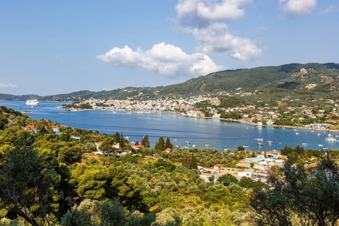 View of the bay near Skiathos town Seaside holiday on the Mediterranean island of Skiathos, Greece,