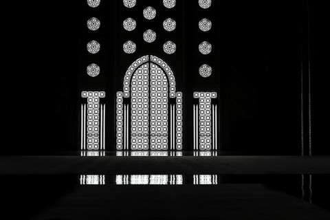 Light incidence in the darkness, interior door and window, arabesque, ornaments in the Hassan II