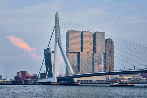 ROTTERDAM, NETHERLANDS, MAY 25, 2018: Rotterdam cityscape and Erasmus bridge over Nieuwe Maas on