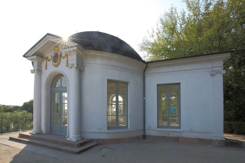 Classicist breakfast pavilion in the castle garden during backlighting, pavilion, Aschaffenburg,