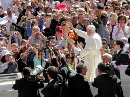 Pope Benedict XVI Joseph Ratzinger between crowds and photographers in the papamobile, 1st audience