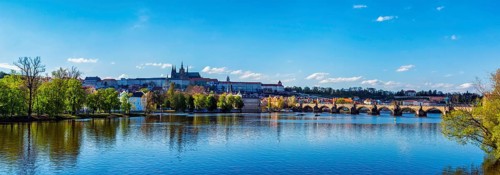 Panorama view of Charles bridge over Vltava river and Gradchany Prague Castle and St. Vitus